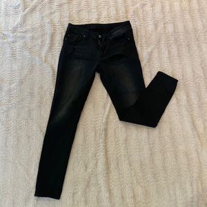 Distressed black stretch jeans